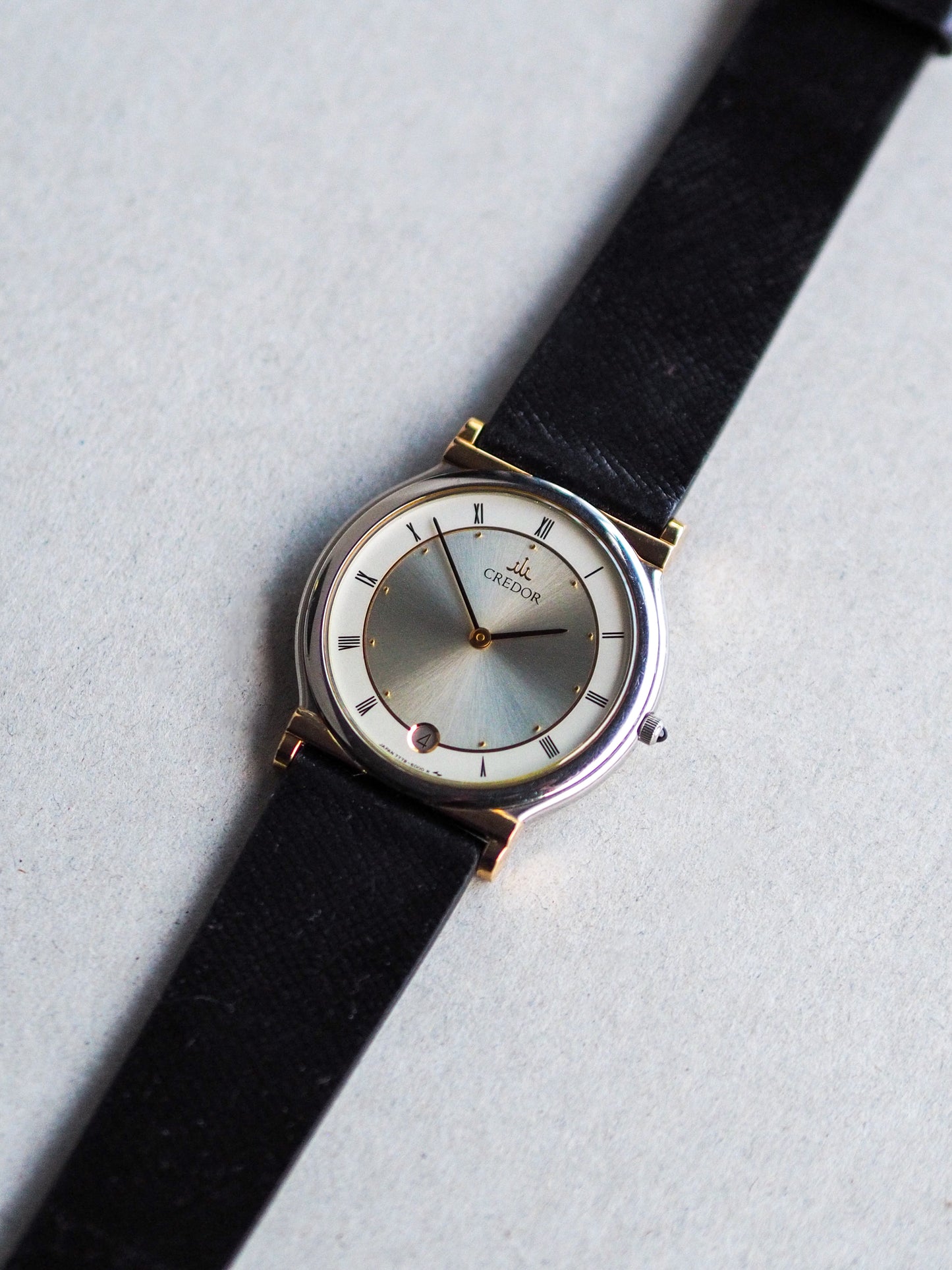 Credor 7779-6000 Two Tone 18K Gold lugs Silver Sunburst Roman Dial