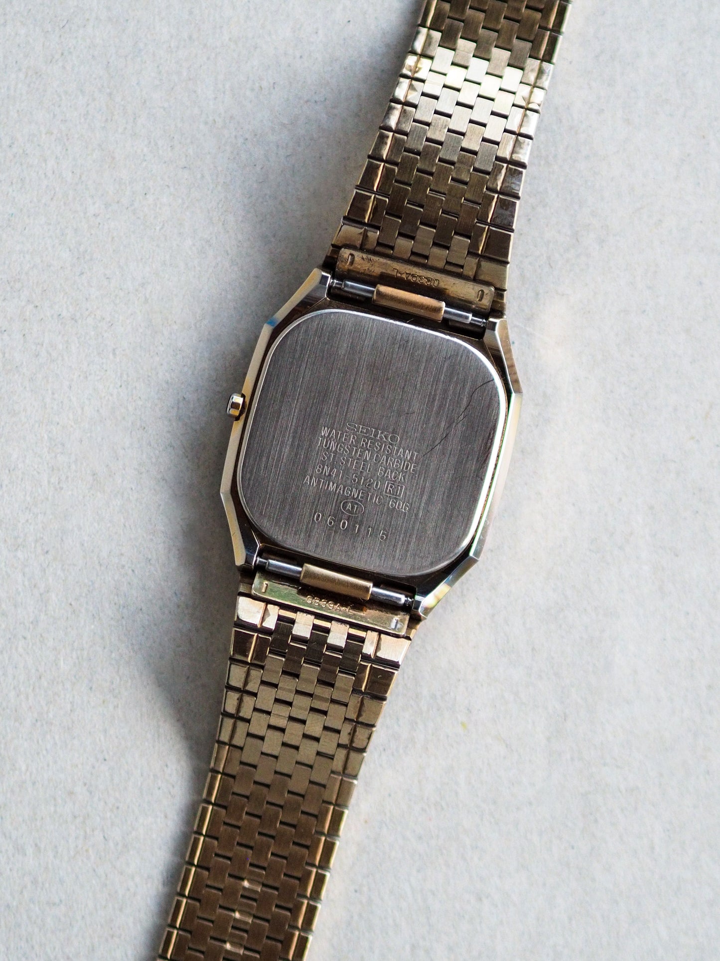 Seiko Dolce 8N41-5120 Tungsten Carbide Octagon Case Champagne Sand Textured Dial