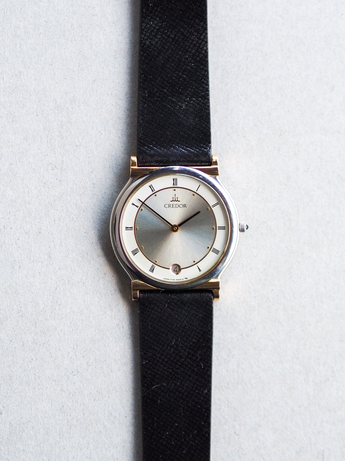 Credor 7779-6000 Two Tone 18K Gold lugs Silver Sunburst Roman Dial