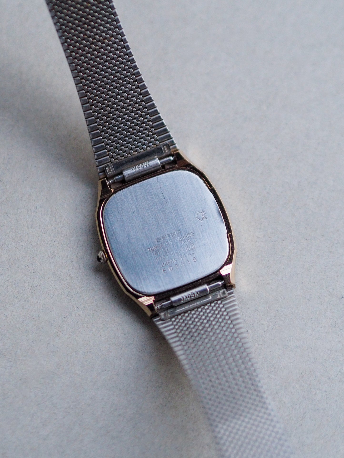 Seiko Dolce 7731-5091 Tonneau Tungsten Carbide Champagne Textured Dial