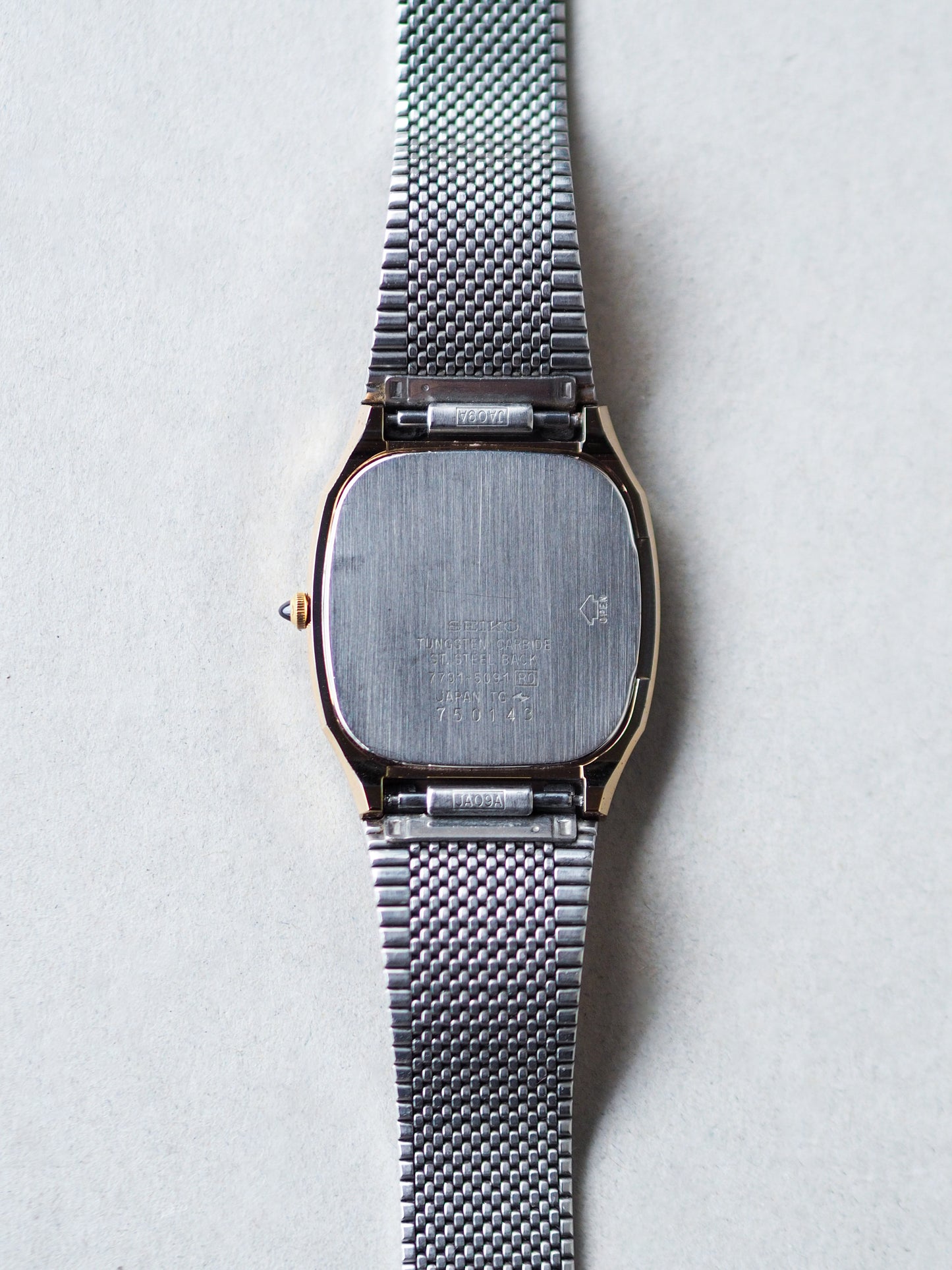 Seiko Dolce 7731-5091 Tonneau Tungsten Carbide Champagne Textured Dial