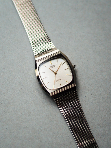 Seiko Dolce 7731-5091 Tonneau Tungsten Carbide Beige Textured Dial