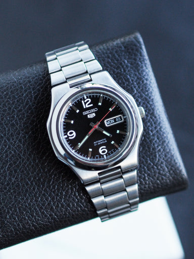 Montre Seiko SNKK59 SeikoNaut – Automatique, Boîtier 39mm Acier, Cadran Noir, Occasion