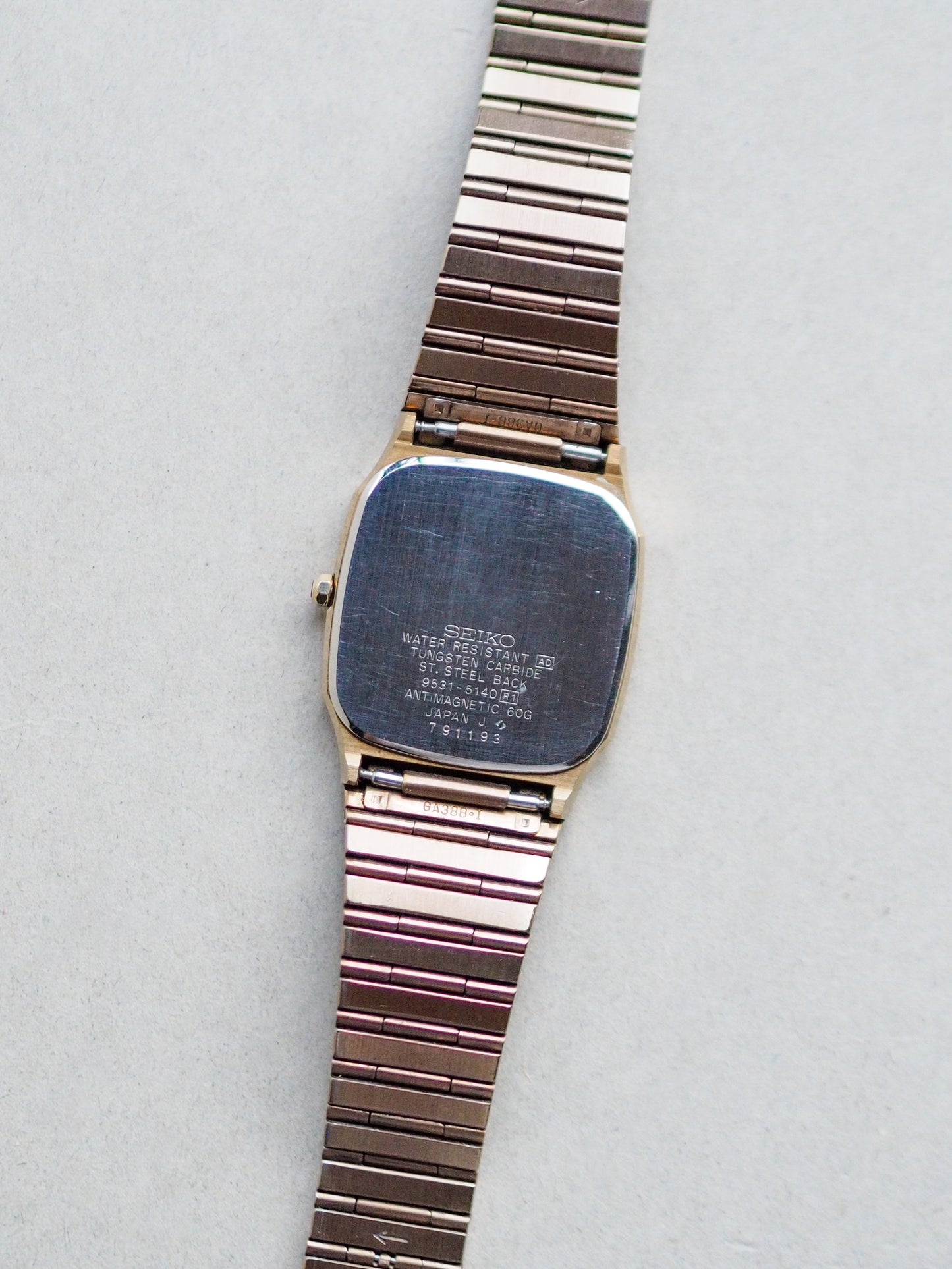Seiko Dolce 9531-5140 Tank Tungsten Carbide Champagne Textured Dial