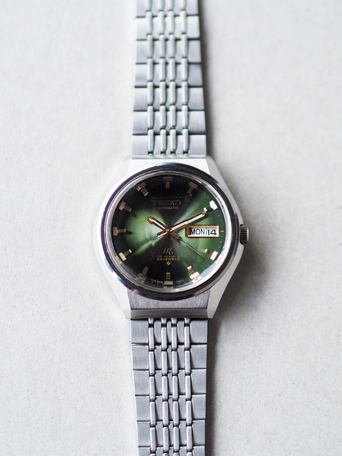 Seiko LM 5606-7320 Lord Matic Faceted Crystal Green Radial Sunburst Di