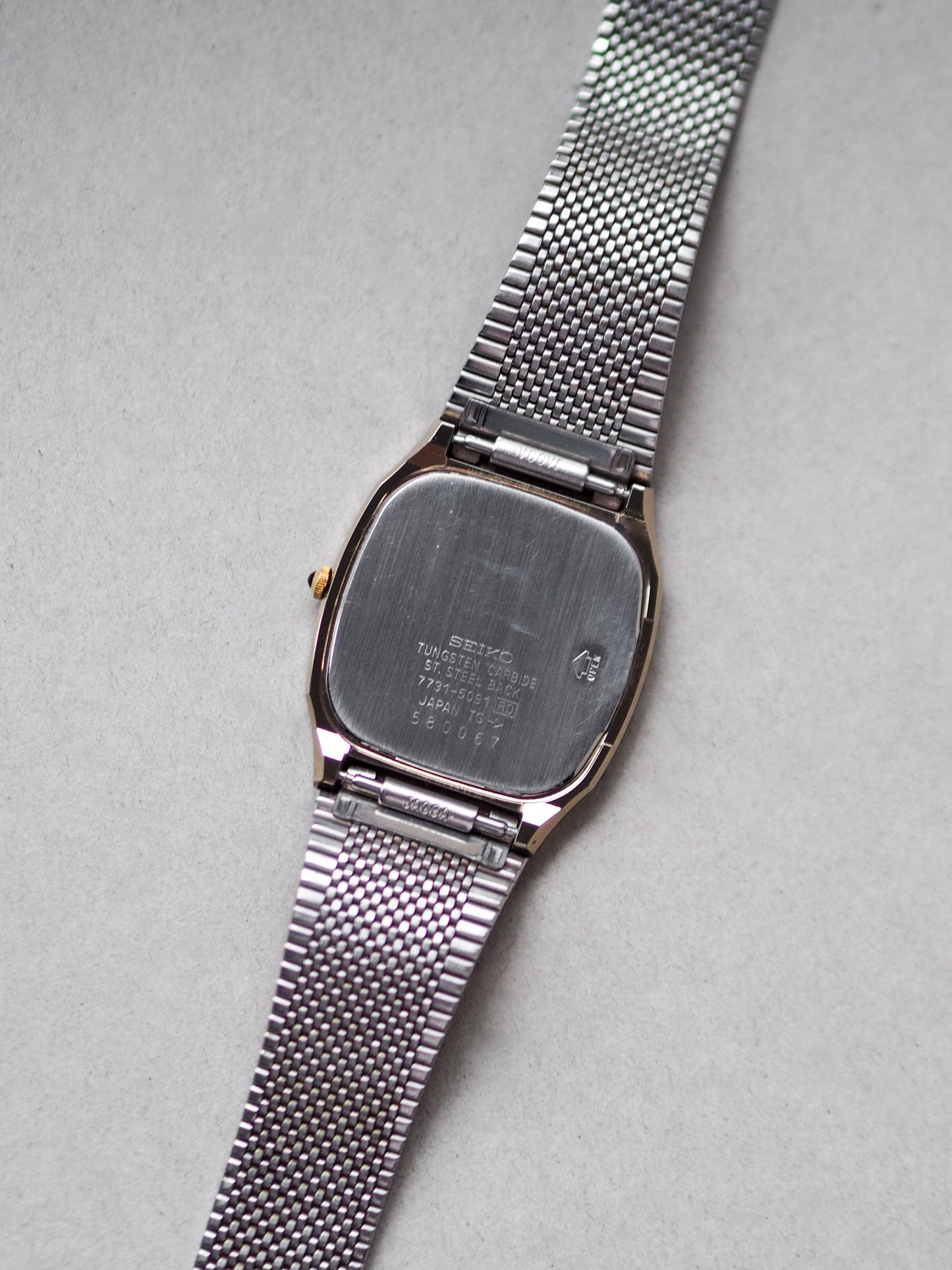 Seiko Dolce 7731-5091 Tonneau Tungsten Carbide Champagne Textured Dial