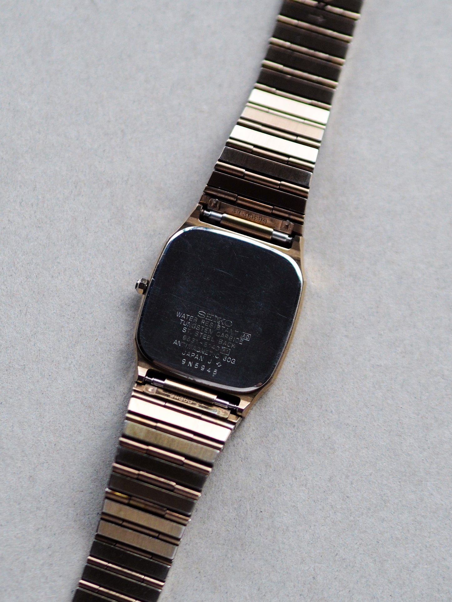 Seiko Dolce 9531-5140 Tank Tungsten Carbide Champagne Textured Dial