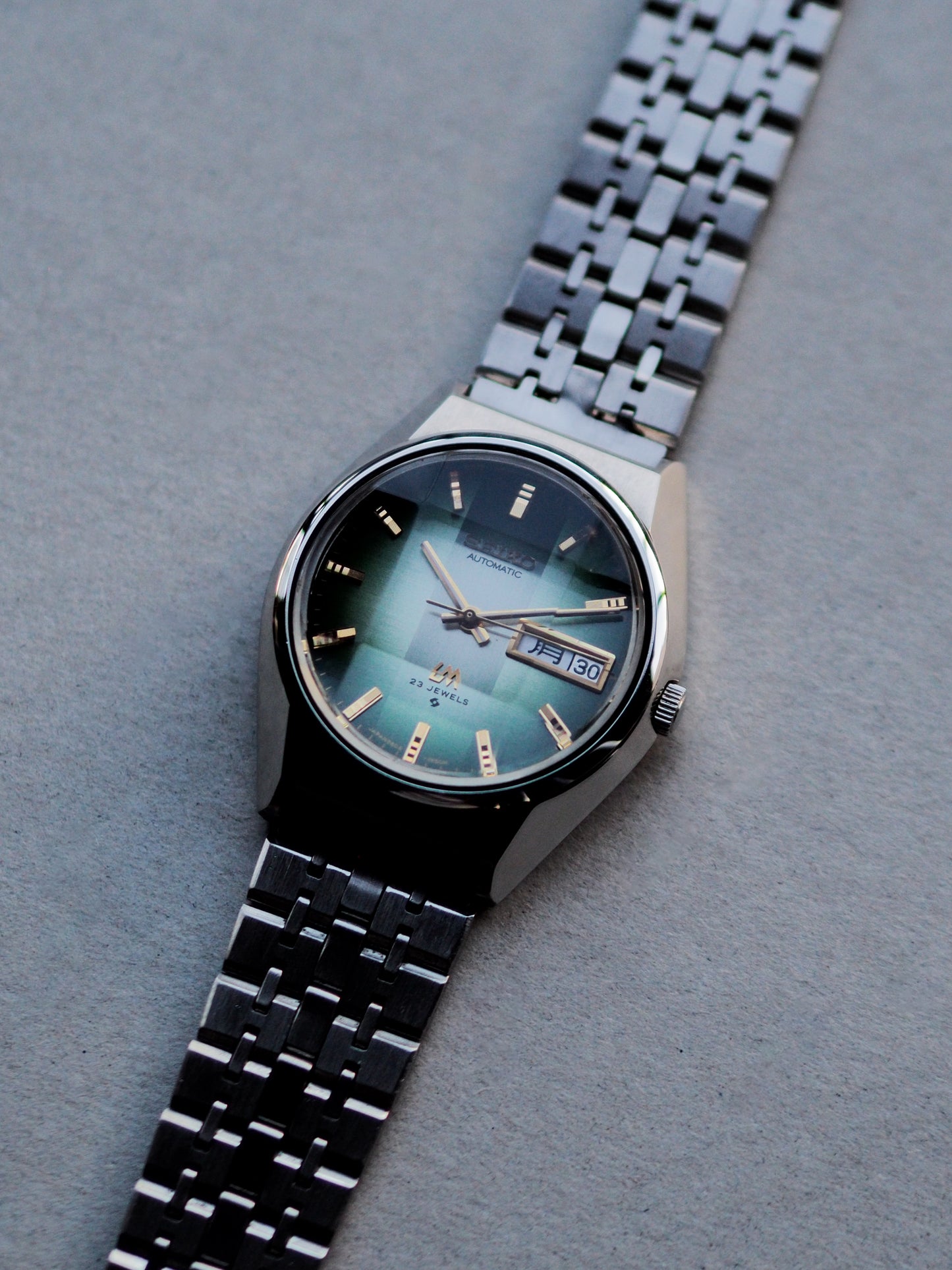 Seiko LM 5606-7310 Lord Matic Faceted Crystal Green Gradient Textured Dial