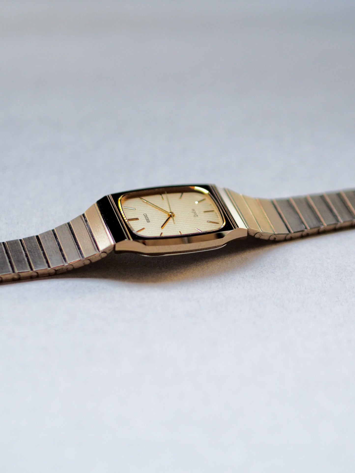 Seiko Dolce 9531-5140 Tank Tungsten Carbide Champagne Textured Dial
