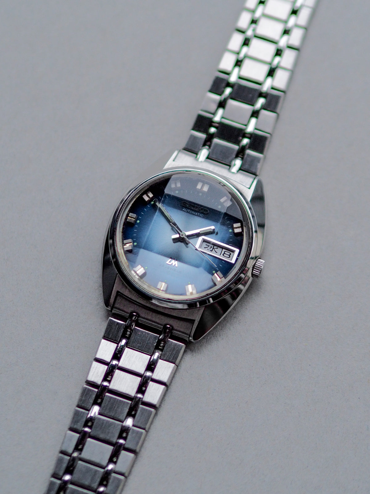 Seiko LM 5606-7230 Lord Matic Faceted Blue Sunburst Dial