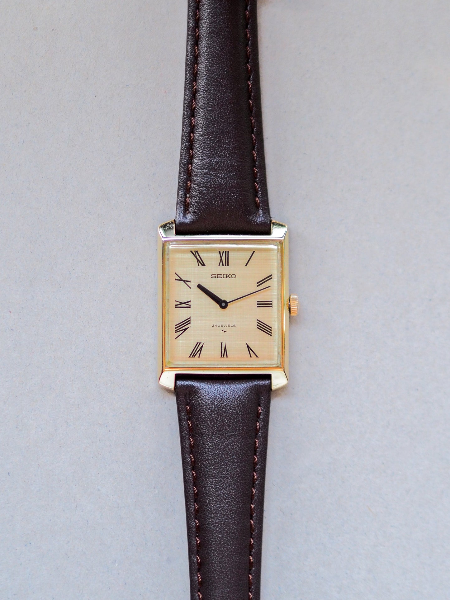 Seiko Chariot Tank 2559-3031 Hi-Beat Cap Gold Champagne Roman Linen Dial